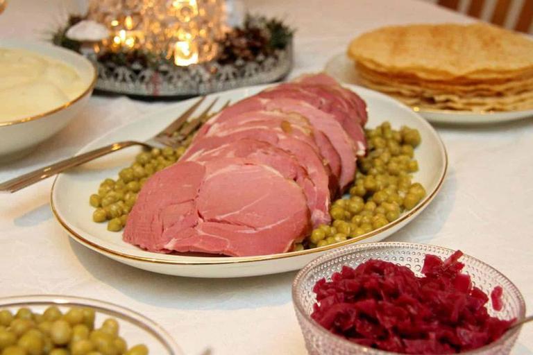Hangikjöt (smoked lamb) is one of the most beloved traditional Icelandic dishes, often served during special occasions like Christmas.